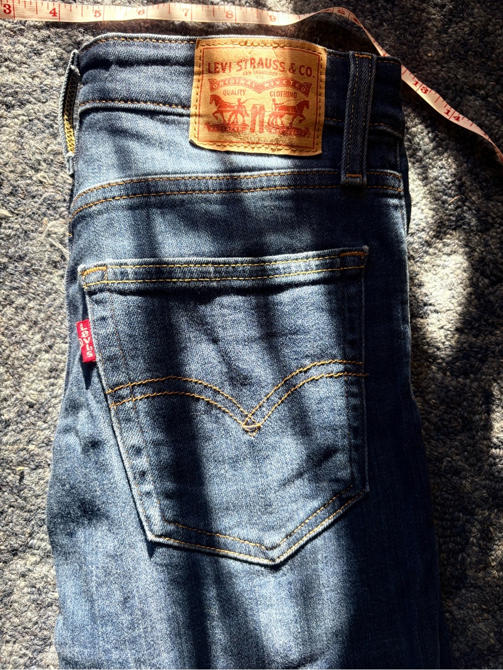 Levi's women’s Blue Denim Jeans - Classic Back Pocket Style. Stretch bootcut